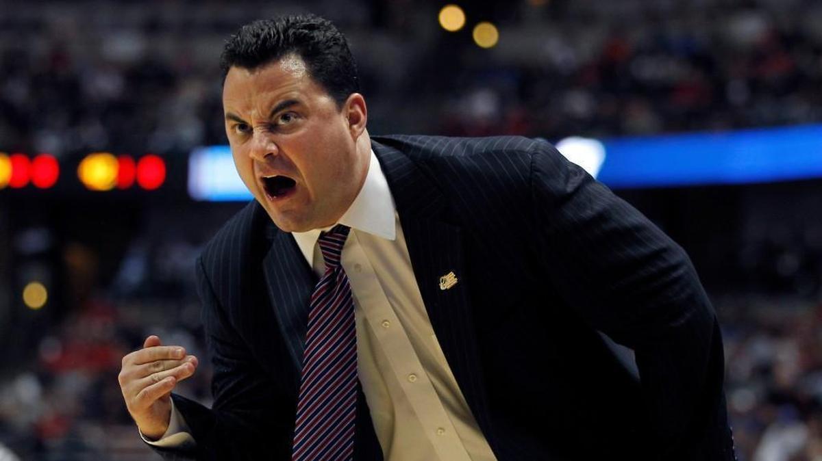Arizona head coach Sean Miller;s name emerged in an ESPN report that claims Miller is heard on FBI wiretaps discussing payments to a player.