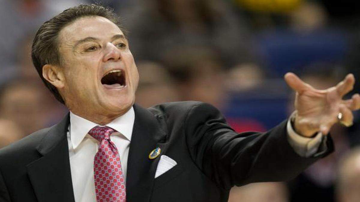 
Louisville coach Rick Pitino directs his team in the first half against North Carolina on Thursday, March 12, 2015, during the quarterfinals of the Atlantic Coast Conference Basketball Tournament at the Greensboro Coliseum in Greensboro. NC State faces Louisville on Friday with an NCAA Elite Eight berth on the line.
