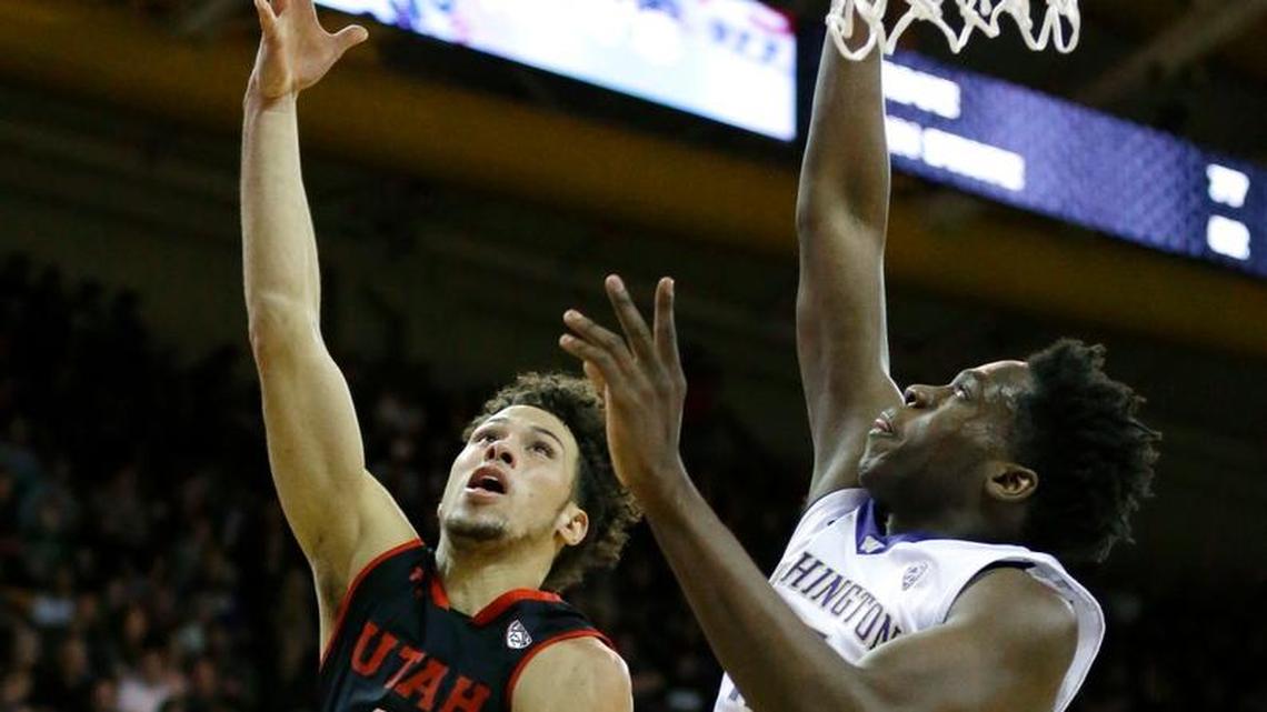 Utah guard Devon Daniels (3) shoots against Washington forward Noah Dickerson, right, on Jan. 21, 2017, in Seattle. Daniels is visiting N.C. State on Monday. (AP Photo/Ted S. Warren)