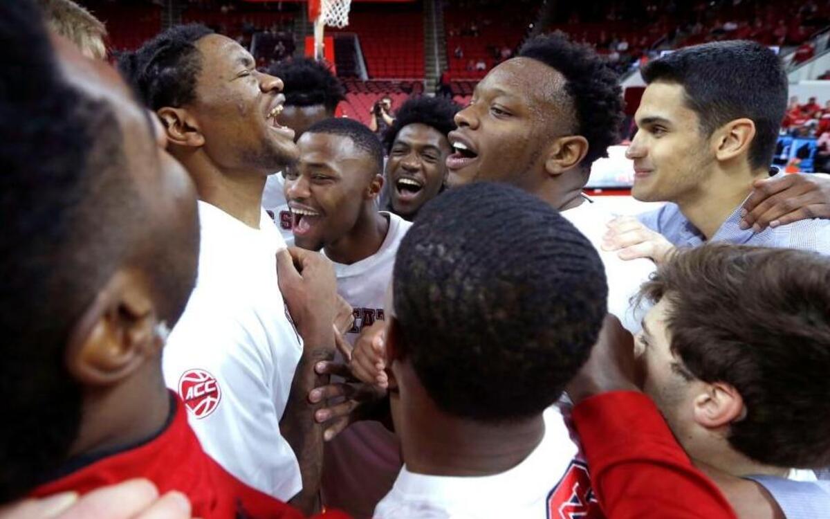 From left, N.C. State's Ted Kapita, Torin Dorn, Darius Hicks, BeeJay Anya and Omer Yurtseven, along with the rest of the team, huddle before the Wolfpack's game against St. Francis College at PNC Arena in Raleigh Sunday, Nov. 13, 2016.