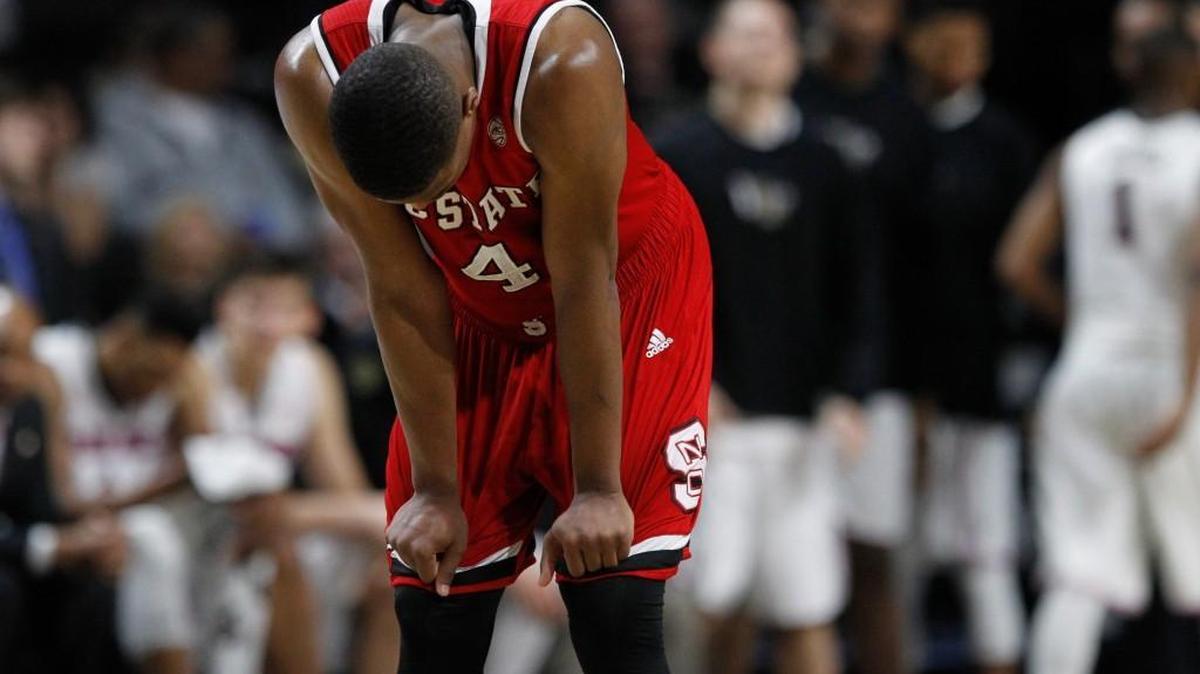 N.C. State's Dennis Smith Jr. (4) takes a breather during the second half of Wake Forest's 88-58 victory over N.C. State at Lawrence Joel Veterans Memorial Coliseum in Winston-Salem on Feb. 11.
