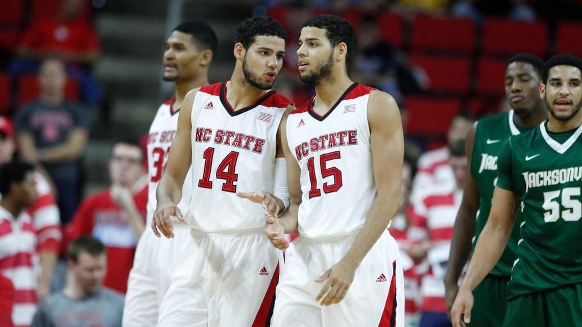 Former N.C. State player Caleb Martin, left, and his twin brother, Cody Martin, have transferred from the NCSU Wolfpack to the Nevada Wolf Pack. (Yes, they spell it as two words.) And Nevada is still in the NCAA Tournament if you're looking for a team to pull for.