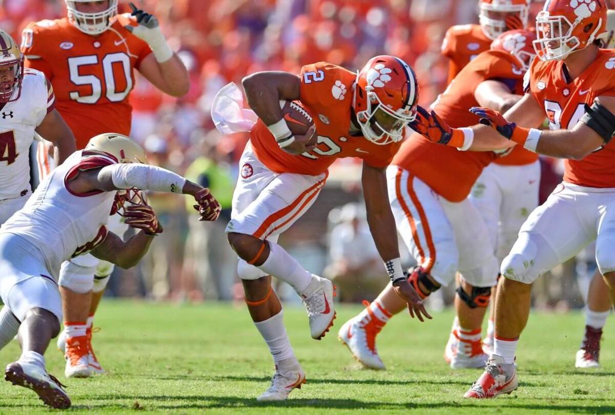 Clemson quarterback Kelly Bryant, center, scrambles for a first down against Boston College on Sept. 23, 2017, in Clemson, S.C.
