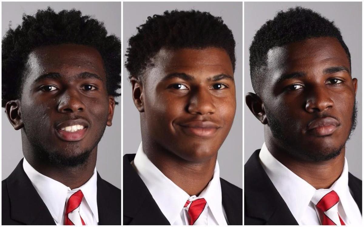 Suspended NC State freshman football players, from left, Erin Collins, Xavier Lyas and Isaiah Moore.