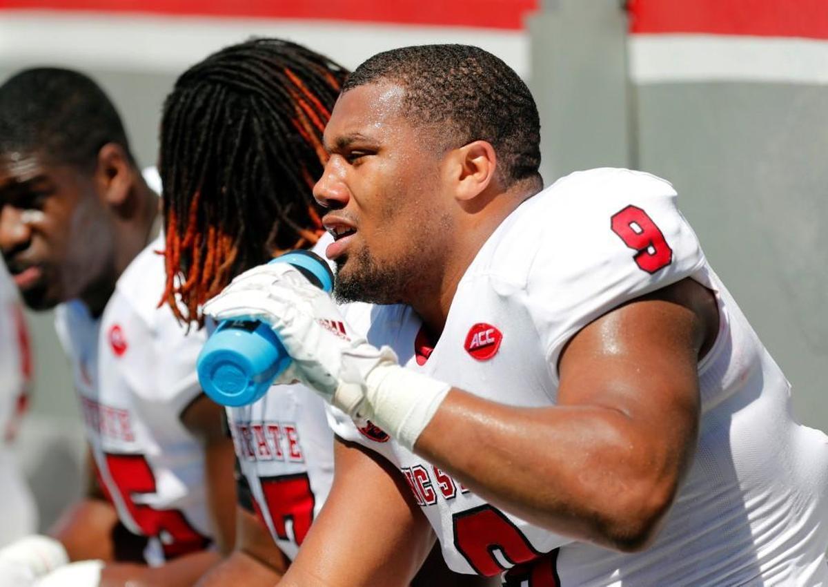 N.C. State's Bradley Chubb (9) takes a break during the Kay Yow N.C. State intra-squad spring football game played at Carter-Finley Stadium on April 1, 2017.