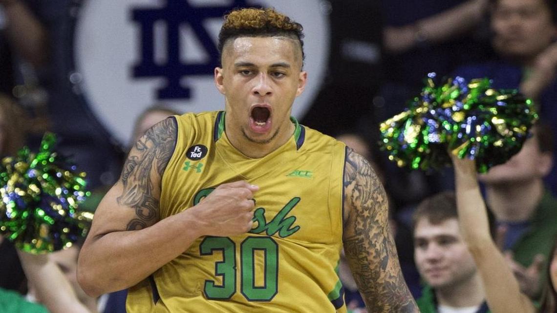 Notre Dame’s Zach Auguste celebrates after a dunk during the first half against North Carolina State in South Bend, Ind.