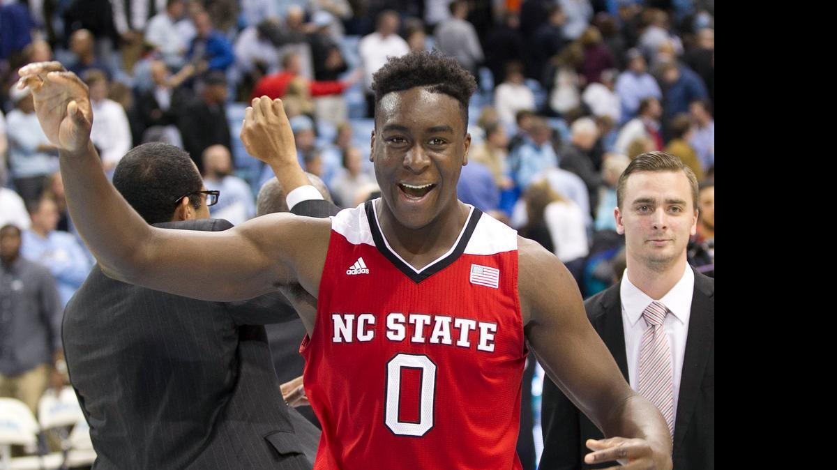 
N.C. State’s Abdul-Malik Abu (0) celebrates the Wolfpack’s 58-46 victory over North Carolina on Tuesday, Feb. 24, 2015 at the Smith Center in Chapel Hill.
