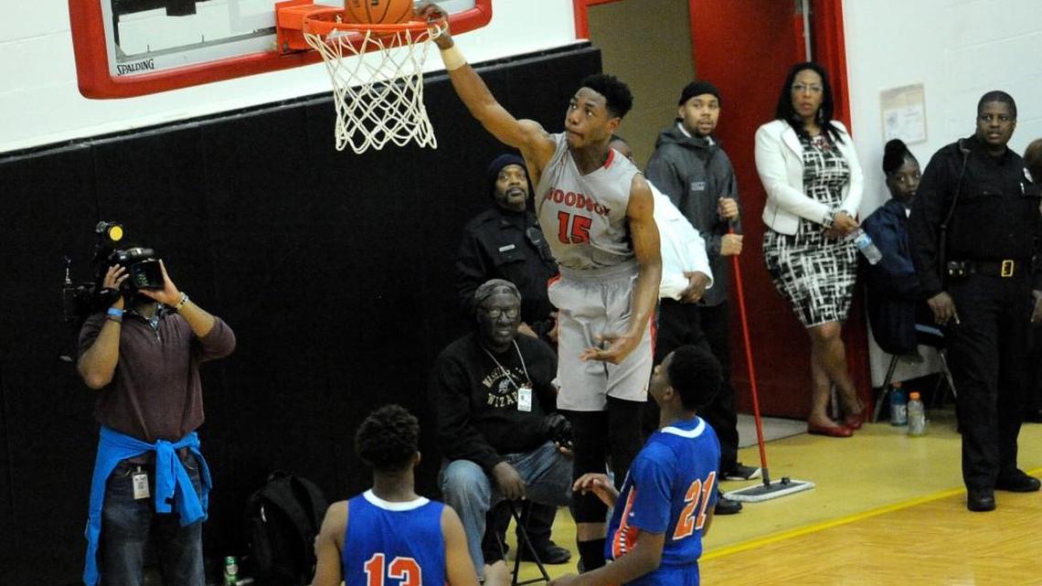 H.D. Woodson Warriors senior Antwan Walker (15) goes in for his second dunk in the second period of the D.C. Interscholastic Athletic Association championship game at UDC February 24, 2016 in Washington, DC.