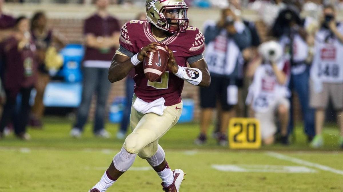
Florida State quarterback Everett Golson rolls out to pass during the first half of an NCAA college football game against Texas State in Tallahassee, Fla., Saturday.

