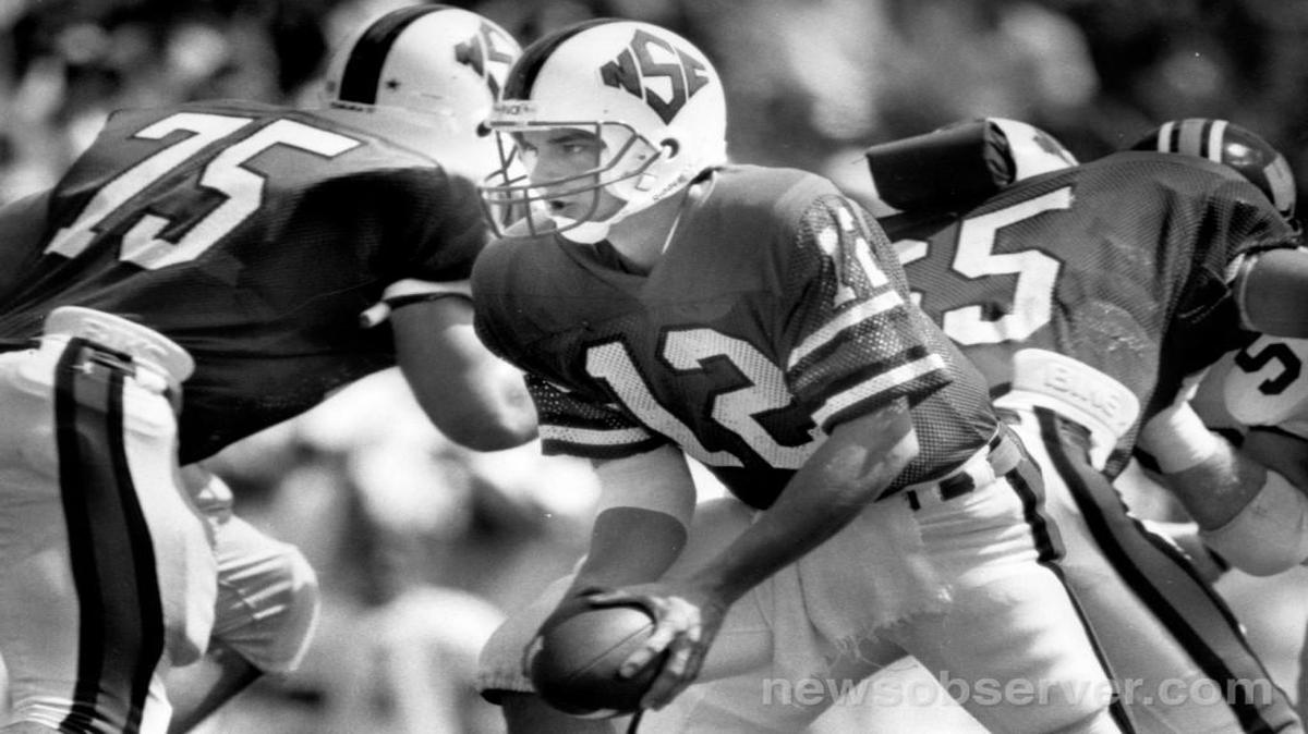 
A 1986 photo shows NC State quarterback Erik Kramer in action against Wake Forest. 
