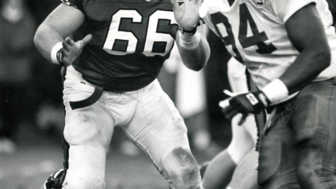 Steve Keim, playing left guard for N.C. State in the 1990’s