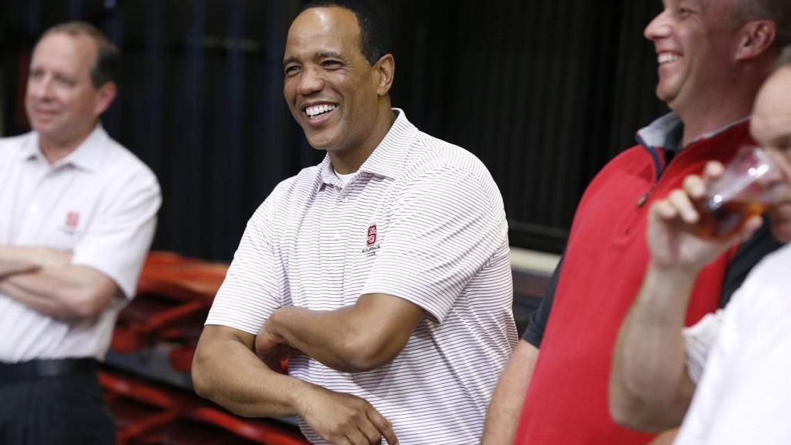 N.C. State men's basketball coach Kevin Keatts, left, laughs with head football coach Dave Doeren during the N.C. State Wolfpack Club Coaches Caravan at Reynolds Coliseum on April 27, 2017.