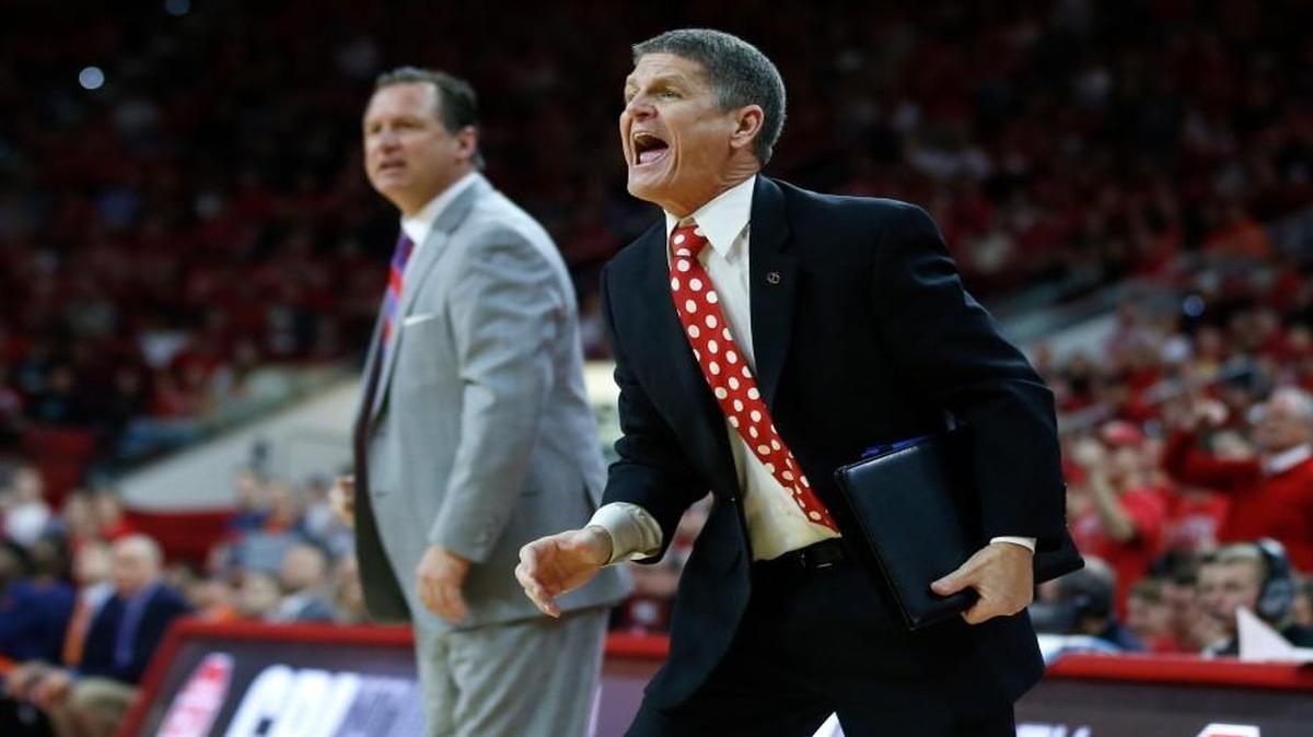 Bobby Lutz, right, is taking a new role with the basketball program.