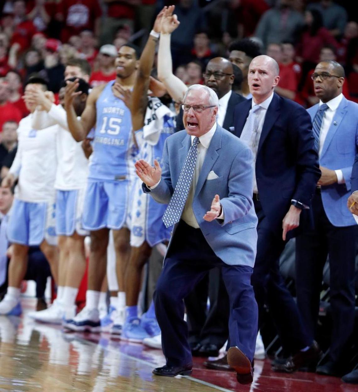 North Carolina head coach Roy Williams cheers on the team during the second half of UNC's 96-89 victory over N.C. State at PNC Arena on Feb. 10, 2018.