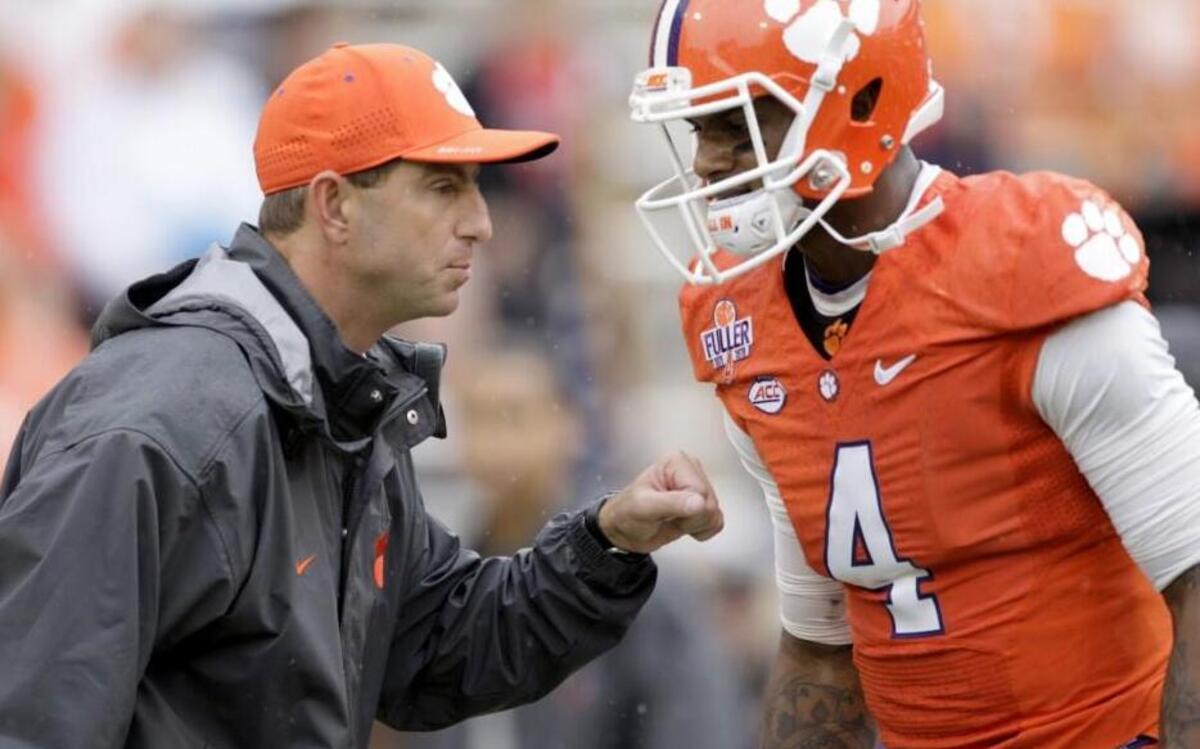 
Head Coach Dabo Swinney of the Clemson Tigers talks with quarterback Deshaun Watson prior to their game against the Georgia Tech Yellow Jackets at Memorial Stadium on October 10, 2015 in Clemson, South Carolina. 
