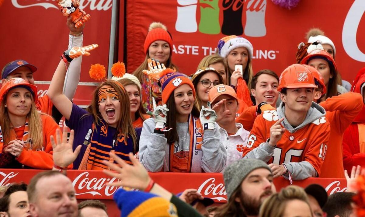 Clemson fans cheer at the ESPN College GameDay event at Romare Bearden Park in Charlotte the morning before the ACC championship game.