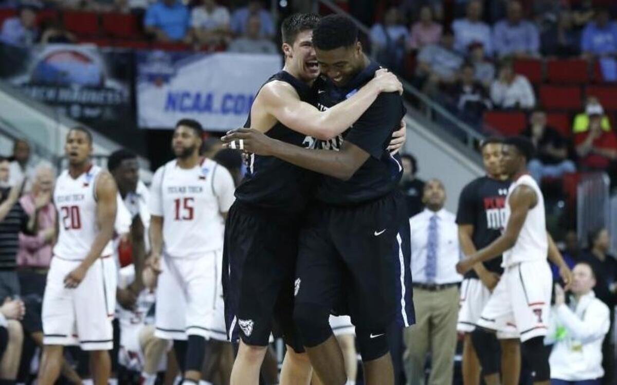 Butler's Kellen Dunham, left, and Kelan Martin celebrate after the Bulldogs’ 71-61 victory over Texas Tech in the first round of the NCAA Division I Men's Basketball Championship at PNC Arena in Raleigh.