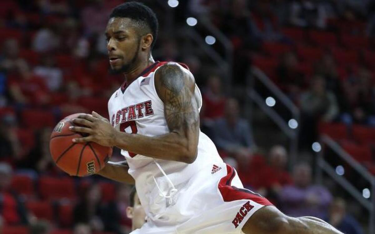 N.C. State's Terry Henderson (3) pulls in a rebound during the first half of the Wolfpack's game against William & Mary at PNC Arena in November.