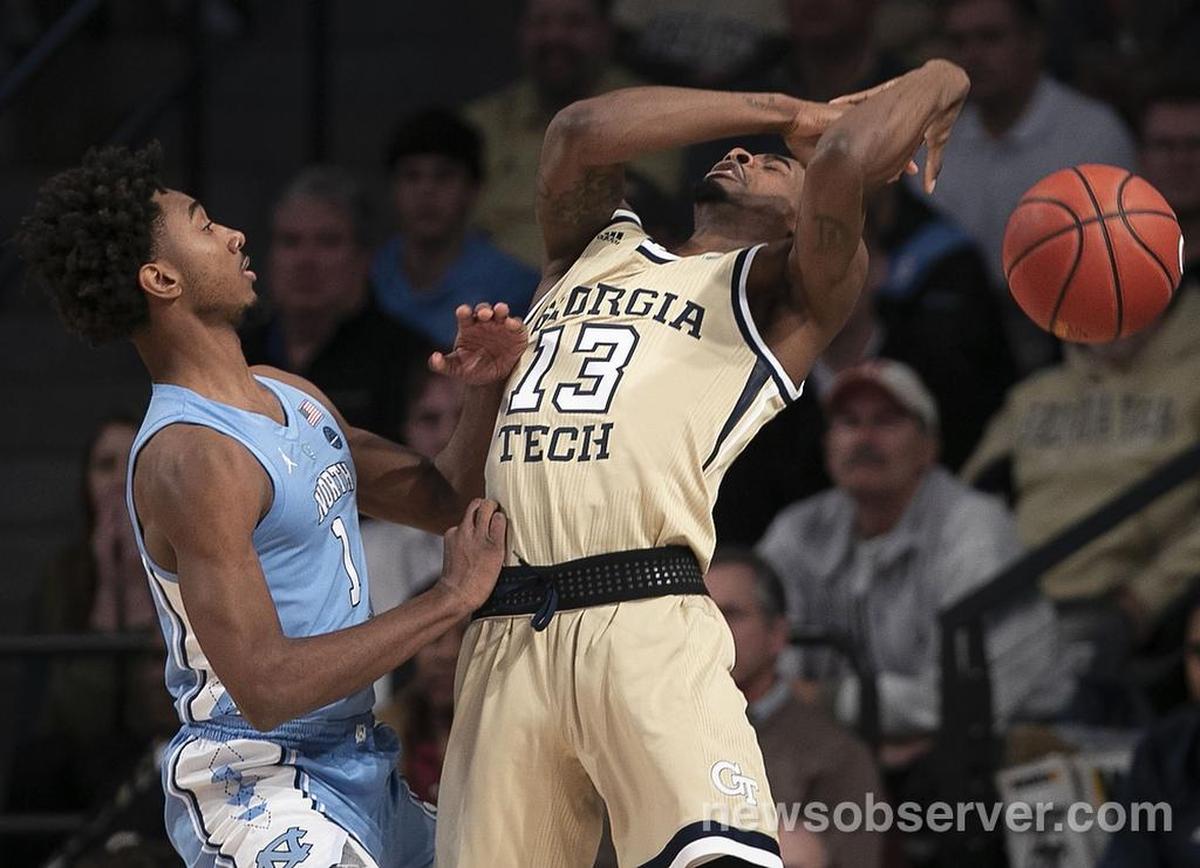 North Carolina’s Leaky Black (1) forces a turnover by Georgia Tech’s Curtis Haywood II (13) during the first half on Tuesday, January 29, 2019 at McCamish Pavilion in Atlanta, Georgia.