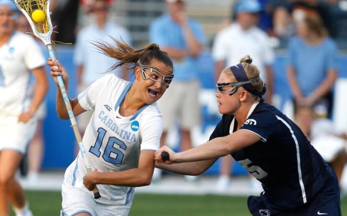 North Carolina’s Carly Reed, left, drives to the goal in the as Katie O'Donnell of Penn State defends in the NCAA Women's Lacrosse semifinal on on May 27, 2016 at Talen Energy Stadium in Chester, PA.