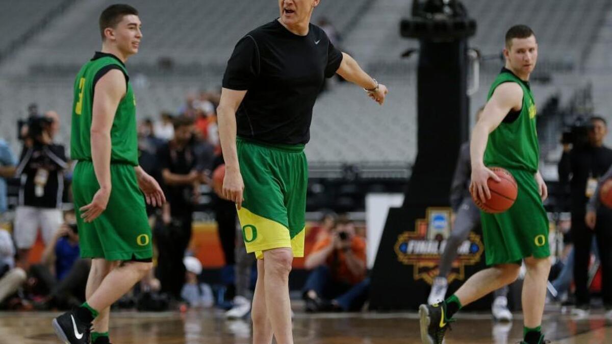 Oregon head coach Dana Altman directs his team during a practice session for their Final Four game on Friday.