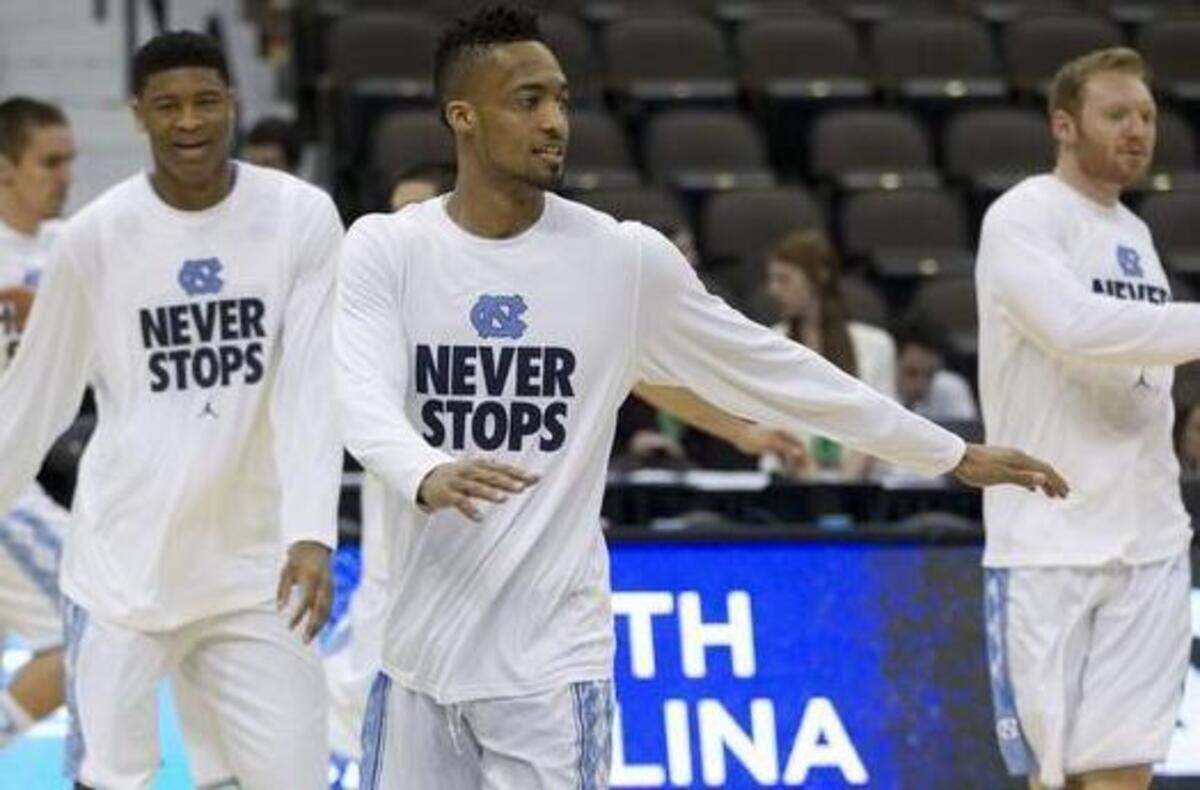 
North Carolina’s J.P. Tokoto, center, and his teammates warm up for their game against Harvard in the second round of the NCAA Tournament on Thursday, March 19, 2015 at the Jacksonville Veterans Memorial Arena in Jacksonville, Fla.
