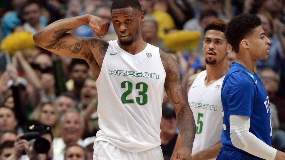 Oregon forward Elgin Cook (23) reacts after hitting a shot against Duke Thursday. The Ducks face Oklahoma in the Elite Eight Saturday.