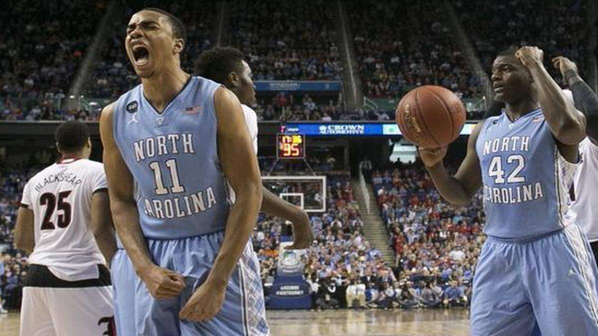 
North Carolina’s Brice Johnson lets off steam after he makes a shot and draws a foul against Louisville during the quarterfinals of the ACC tournament Thursday at the Greensboro Coliseum.
