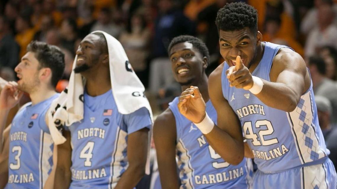 North Carolina’s Brandon Huffman (42) and the bench react after after teammate Theo Pinson (1) sank two free throws to give the Tar Heels a 74-70 lead with 16 seconds to play against Tennessee on December 17, 2017 at Thompson-Boling Arena in Knoxville, Tenn.