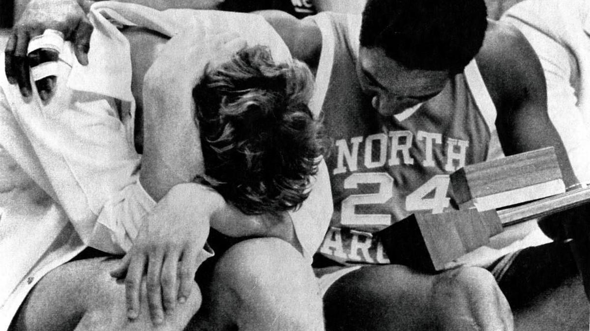 Walter Davis, right, consoles Mike O'Koren after UNC's loss to Marquette in the 1977 National Championship.