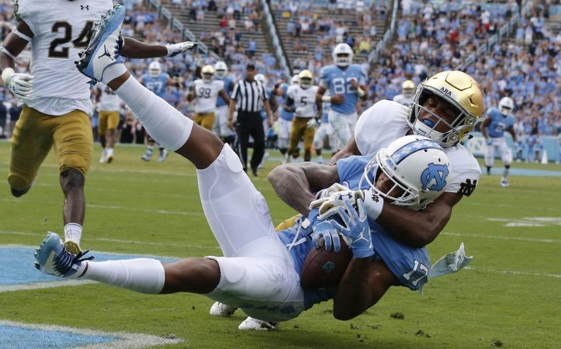 North Carolina wide receiver Anthony Ratliff-Williams (17) pulls in a 25-yard touchdown reception as Notre Dame cornerback Julian Love (27) defends during the first half of UNC's game against Notre Dame at Kenan Stadium in Chapel Hill, NC Saturday, Oct. 7, 2017.