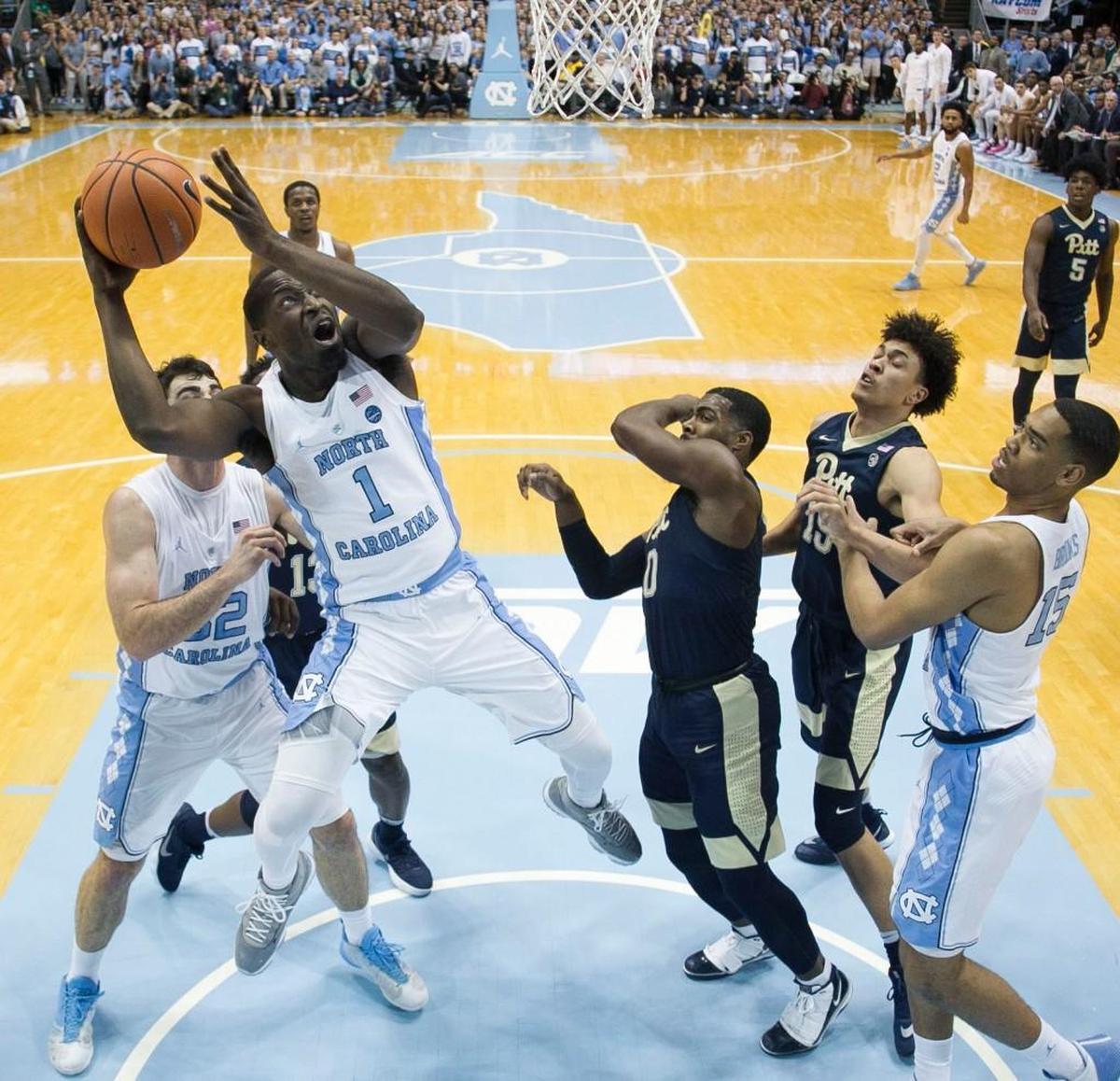 North Carolina’s Theo Pinson (1) puts up a shot against Pittsburgh’s Jared Wilson-Frame (0) during the first half on Saturday, February 3, 2018 at the Smith Center in Chapel Hill, N.C.