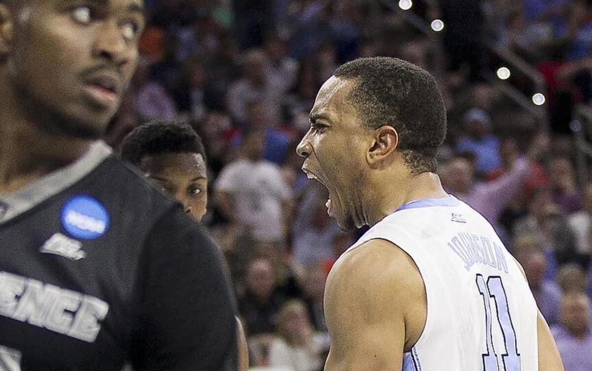 North Carolina’s Brice Johnson (11) reacts after a dunk in the second half against Providence.