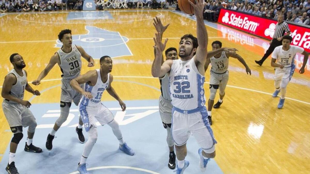 North Carolina’s Luke Maye (32) drives to the basket for two of his game high 17 points against Wake Forest on Saturday, December 30, 2017 at the Smith Center in Chapel Hill.