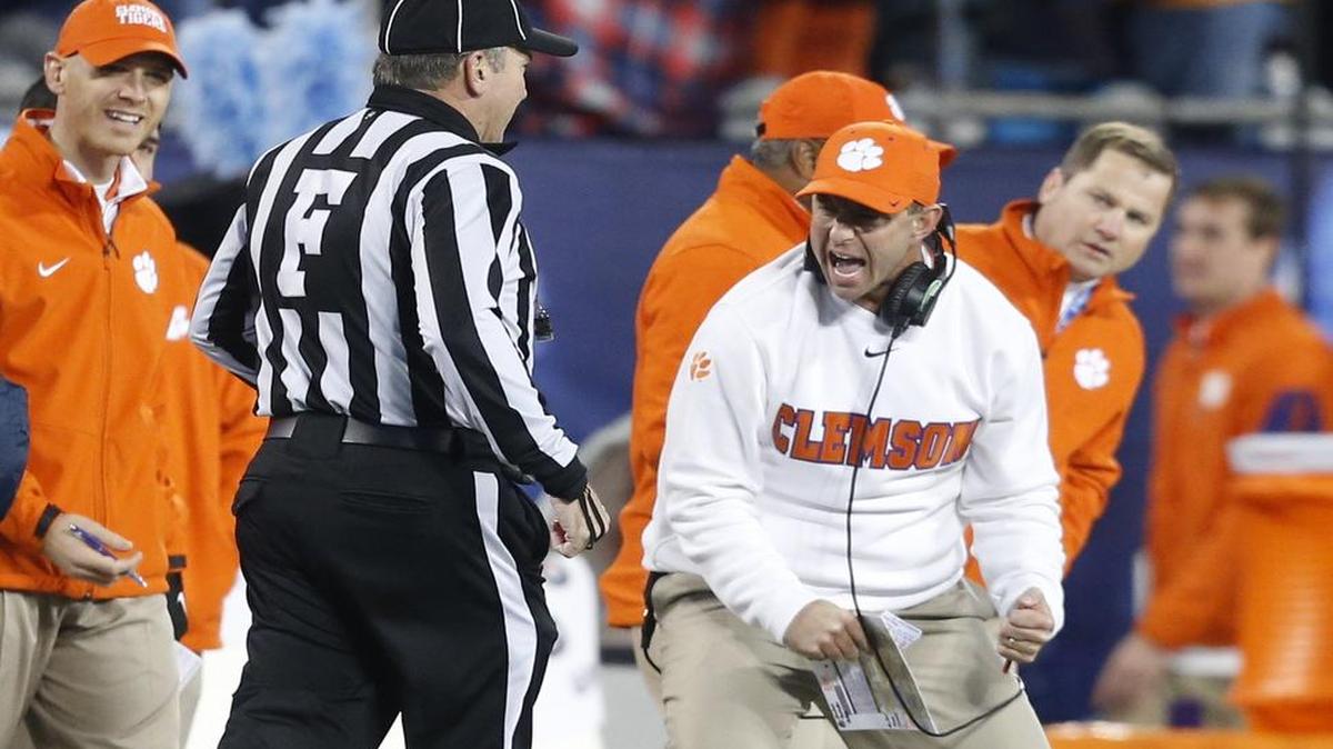 Clemson head coach Dabo Swinney is not happy with the lack of a call by the officials during the first half of UNC's game against Clemson in the ACC Football Championship at Bank of America Stadium in Charlotte Saturday.