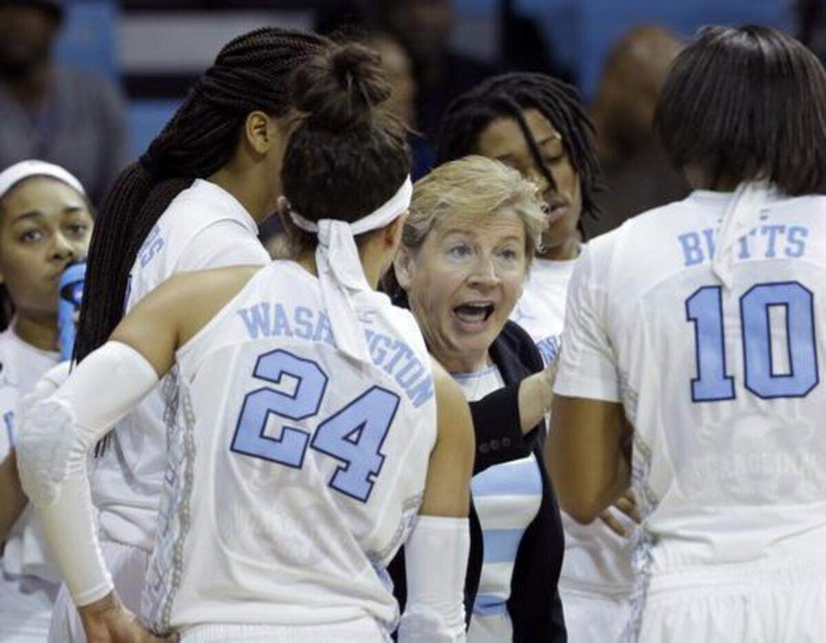 
North Carolina coach Sylvia Hatchell speaks with her players during a timeout in the second half of a women's college basketball game against Liberty in the first round of the NCAA tournament in Chapel Hill, N.C., Saturday, March 21, 2015. North Carolina won 71-65.
