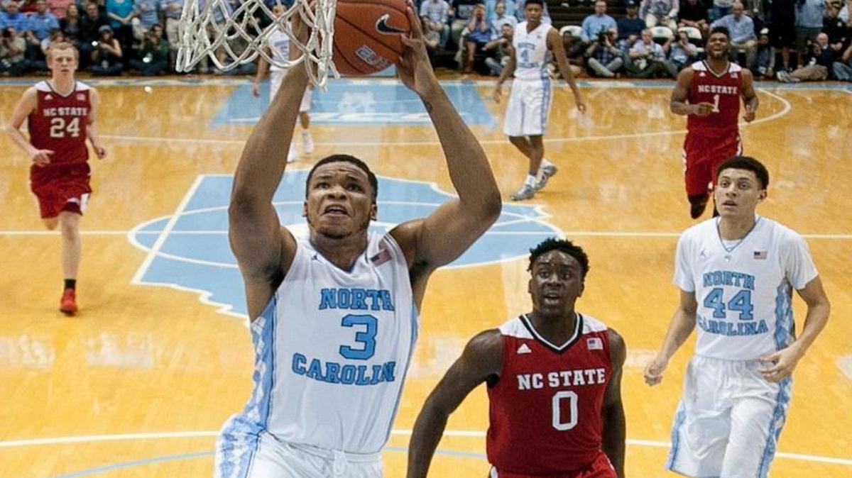 North Carolina’s Kennedy Meeks (3) breaks to the basket for a dunk on a fast break for two of his game high 23 points in the Tar Heels 67-55 victory on January 16, 2015 at the Smith Center.