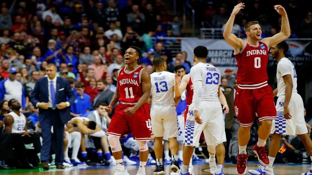 The Indiana Hoosiers’ Yogi Ferrell (#11) and Max Bielfeldt celebrate defeating the Kentucky Wildcats in the second round of the 2016 NCAA Men's Basketball Tournament.