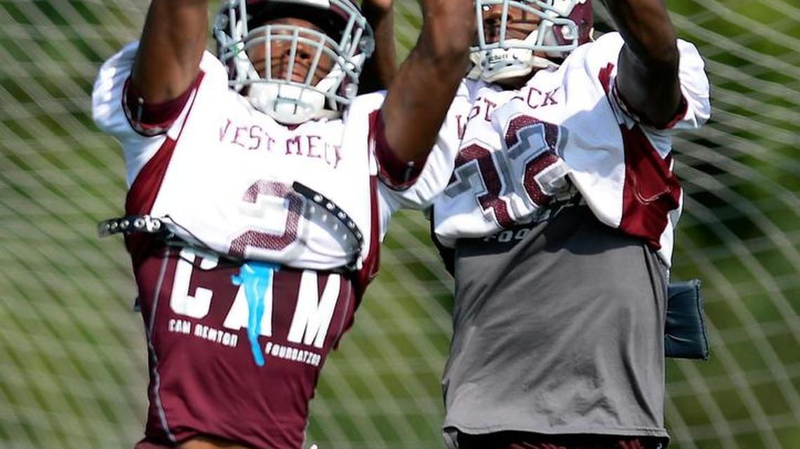 West Meck’s Dyami Brown, left, makes a reception during practice at the school on September 19, 2016. Brown on Tuesday announced he is committing to North Carolina.
