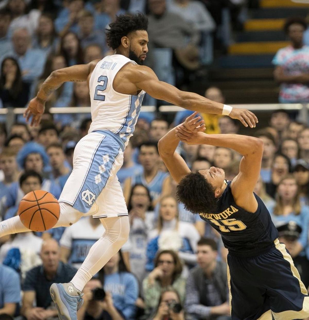 North Carolina’s Joel Berry II (2) makes a steal from Pitt’s Kene Chukwuka (15) during the first half on Saturday, February 3, 2018 at the Smith Center in Chapel Hill, N.C.