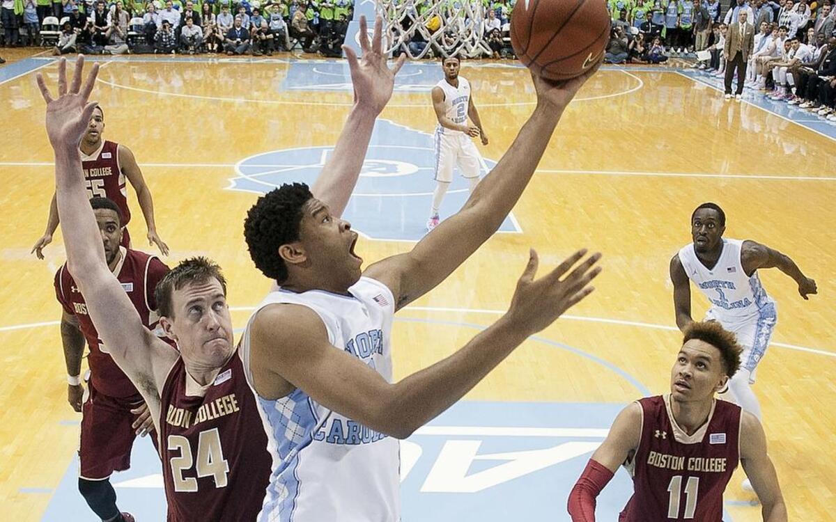 North Carolina’s Isaiah Hicks (4) drives to the basket against Boston College’s Dennis Clifford (24) during the first half on Saturday, January 30, 2016 at the Smith Center in Chapel Hill, N.C.