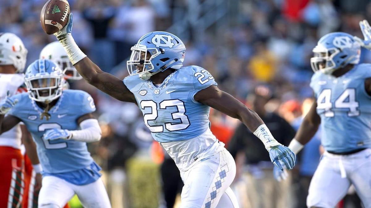 North Carolina’s Cayson Collins (23) celebrates a fumble recover in the first quarter against Miami last week in Chapel Hill..