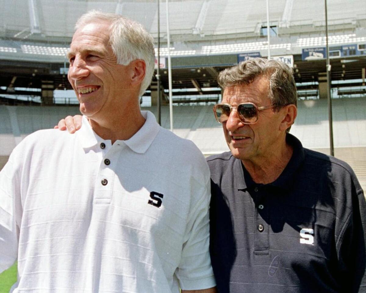 Penn State football coach Joe Paterno, right, poses with his defensive coordinator Jerry Sandusky, during the college football team’s media day in 1999. July 12, 2016 court documents provided new details on allegations that Paterno was told in 1976 about a sex abuse accusation against Sandusky, and that some of Paterno’s assistants witnessed improper contact between Sandusky and children in the 1980s. Sandusky, who was arrested in 2011, is serving 30 to 60 years in prison on a 45-count child molestation conviction.