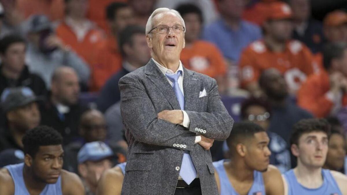 North Carolina coach Roy Williams checks the scoreboard as North Carolina cuts into the Clemson lead in the second half on Tuesday, January 30, 2018 at Littlejohn Coliseum inn Clemson, S.C.