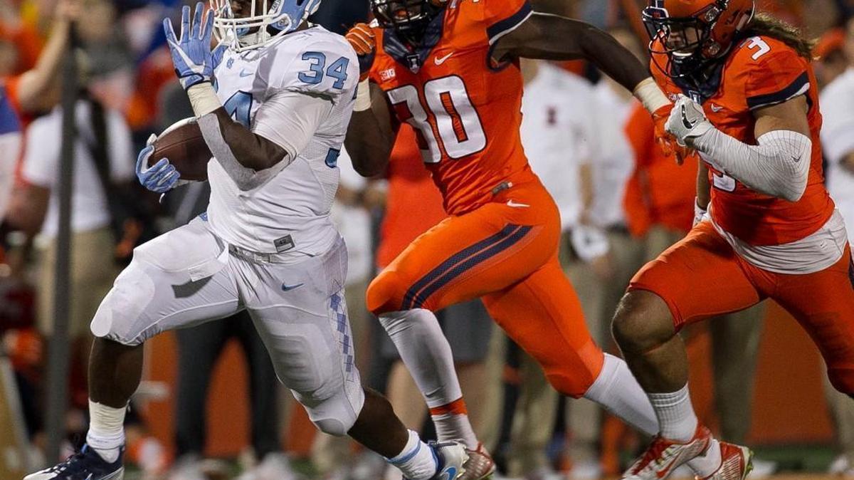 North Carolina’s Elijah Hood (34) romps 62 yards for a touchdown in the fourth quarter to give North Carolina a 45-23 lead over Illinois on Saturday, Sept. 10, 2016 at Memorial Stadium in Champaign, Illinois.