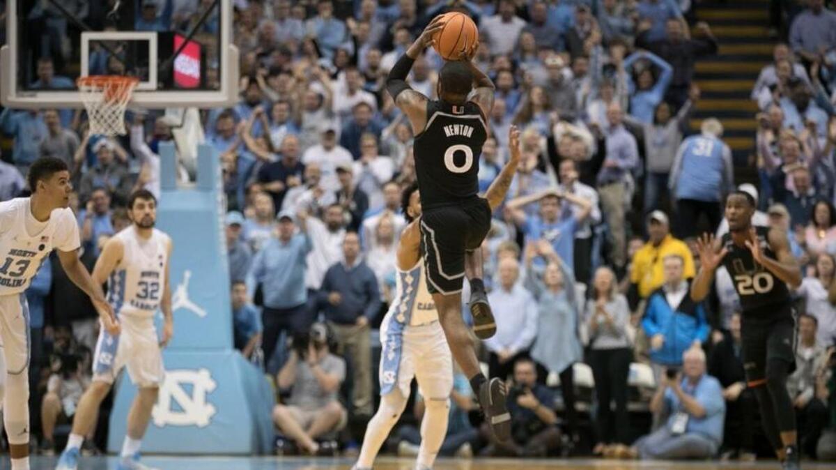 Miami’s JaQuan Newton (0) hits the game-winning shot to give Miami a 91-88 victory over North Carolina with :01 to play in the game on Tuesday, February 27, 2018 at the Smith Center in Chapel Hill, N.C.