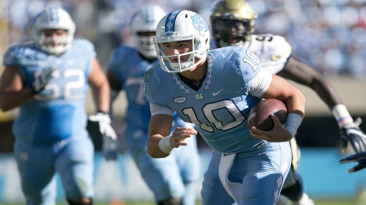 North Carolina quarterback Mitch Trubiksy (10) looks for running room on an 18-yard carry for a touchdown during their victory over Georgia Tech on Saturday.
