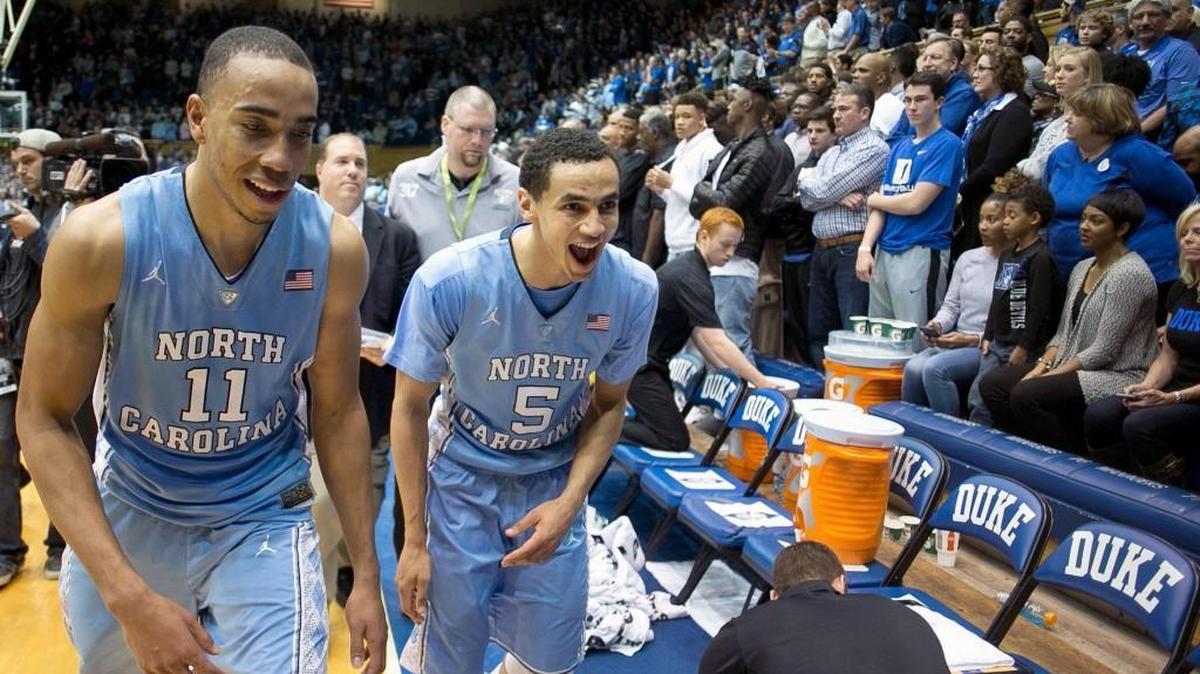 North Carolina's Brice Johnson (11) and teammate Marcus Paige (5) celebrate the Tar Heels' 76-72 victory over Duke on March 5 at Cameron Indoor Stadium.