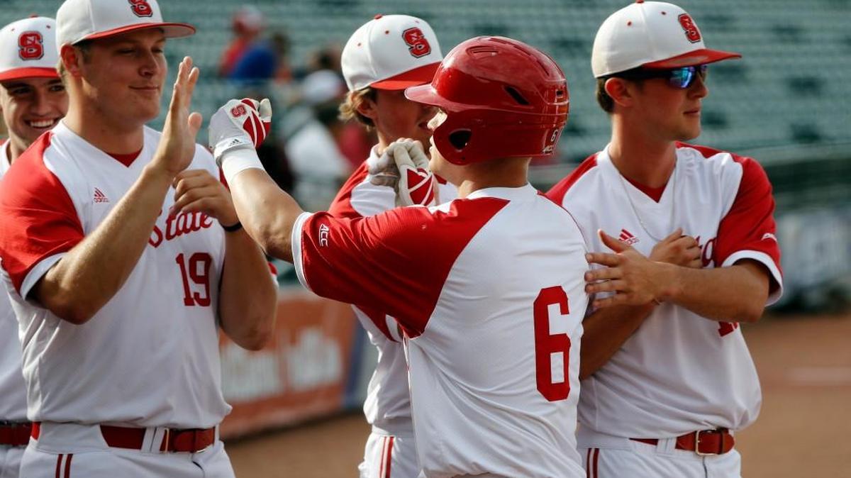 Behind left fielder Brett Kinneman (6), NC State has one of the best offenses in college baseball this season.