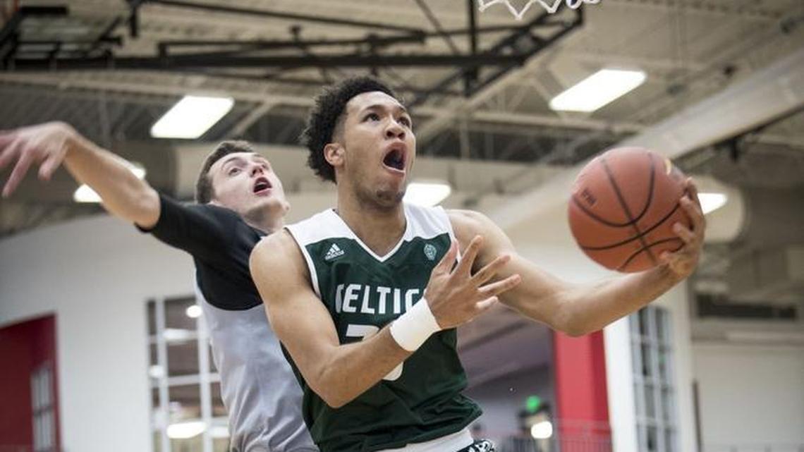 E.J. Montgomery, in green, has narrowed his list to 11, including Duke and UNC.